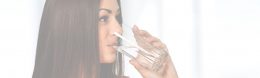 woman drinking glass of water