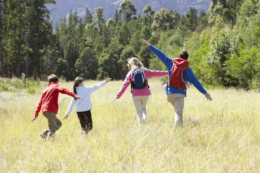 parents and kids on a family hike